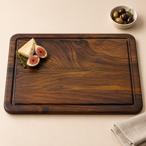 Jozour Classic Cutting Board styled with cheese and figs on a warm beige studio background.
